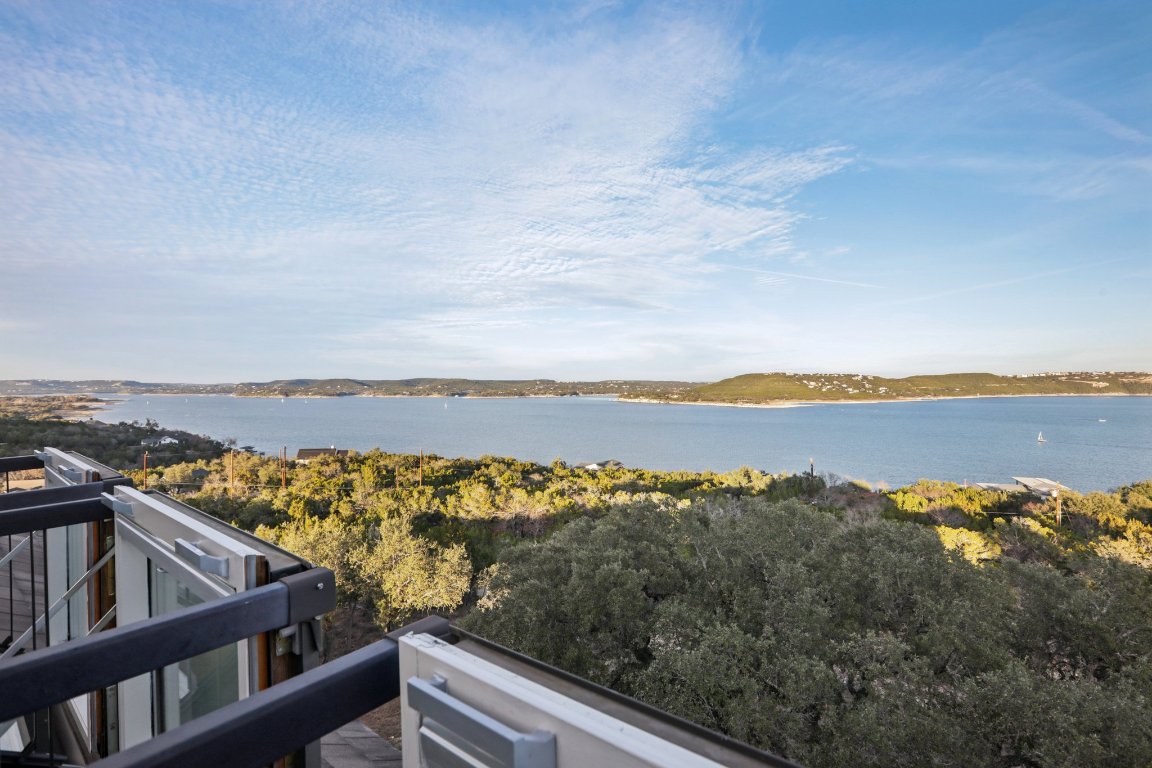 14701 Hornsby Hill Road Austin, TX 78734 - Photo 34 of 40 a view of a balcony with an ocean view