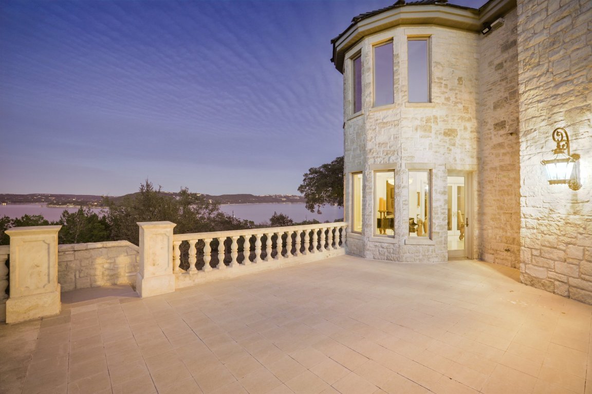 14701 Hornsby Hill Road Austin, TX 78734 - Photo 38 of 40 a front view of a house with a yard
