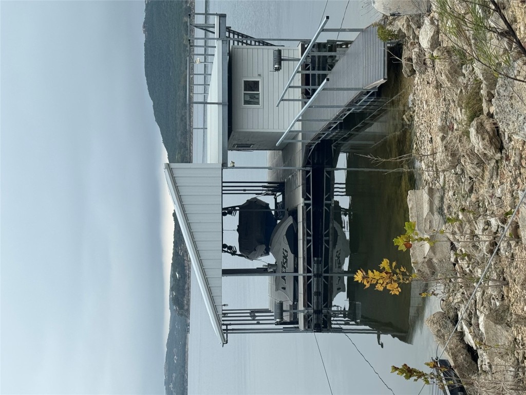 14701 Hornsby Hill Road Austin, TX 78734 - Photo 40 of 40 a kitchen with stainless steel appliances granite countertop a sink stove and refrigerator