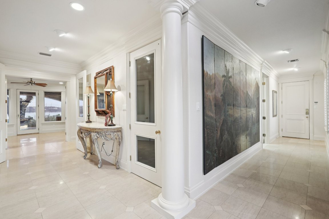 14701 Hornsby Hill Road Austin, TX 78734 - Photo 4 of 40 a view of a hallway with dining area