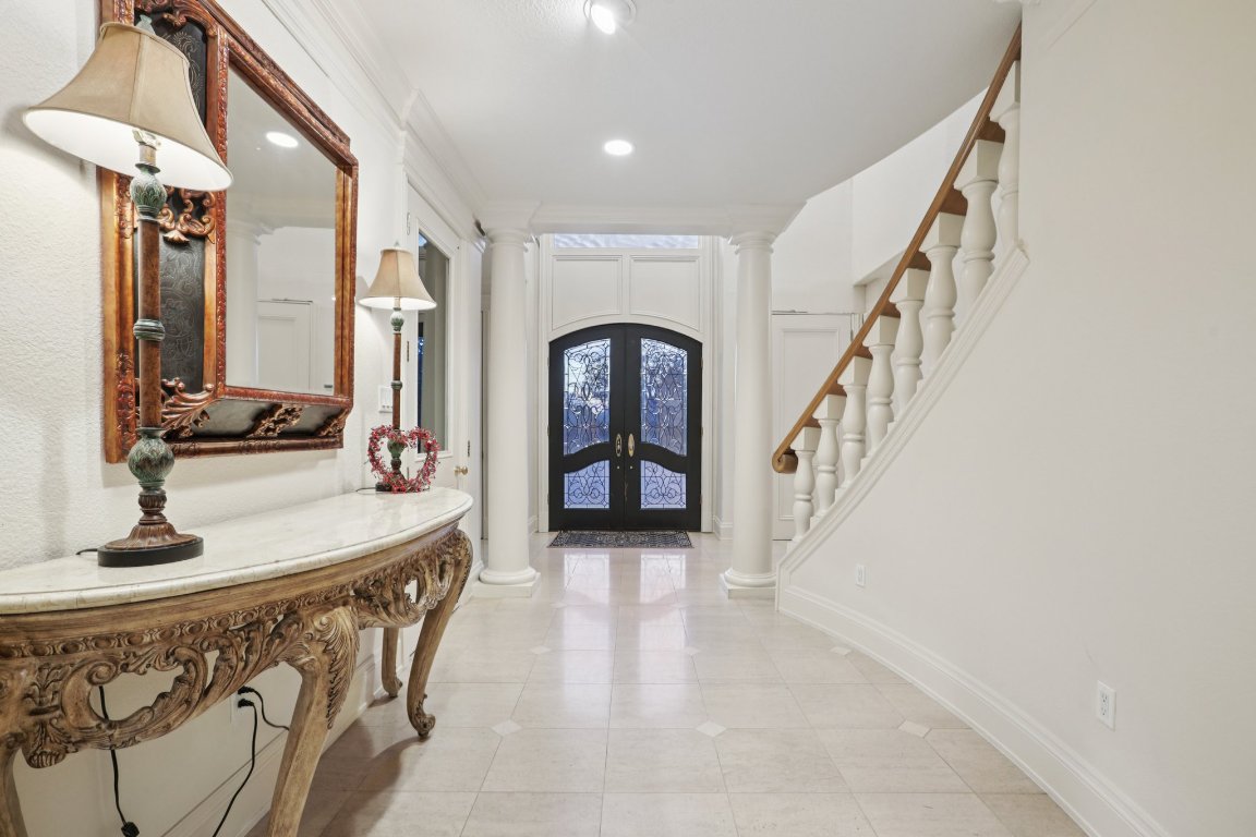 14701 Hornsby Hill Road Austin, TX 78734 - Photo 5 of 40 a view of entryway and hall with a front door