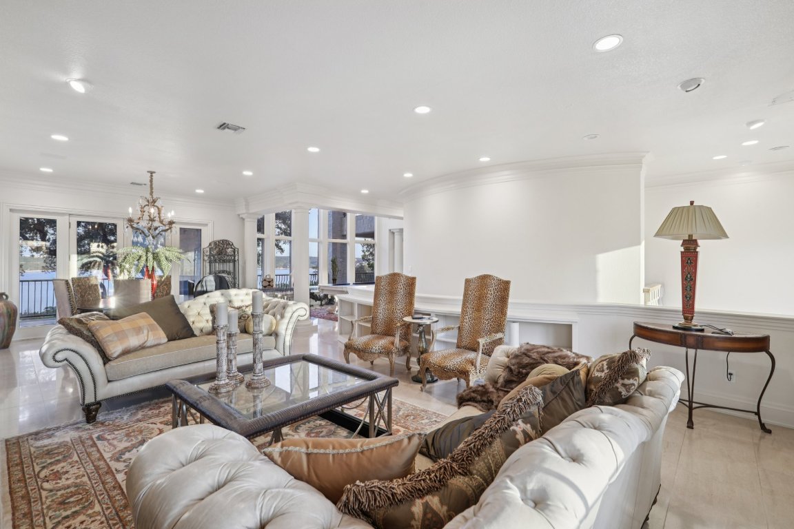 14701 Hornsby Hill Road Austin, TX 78734 - Photo 6 of 40 a living room with furniture and a table