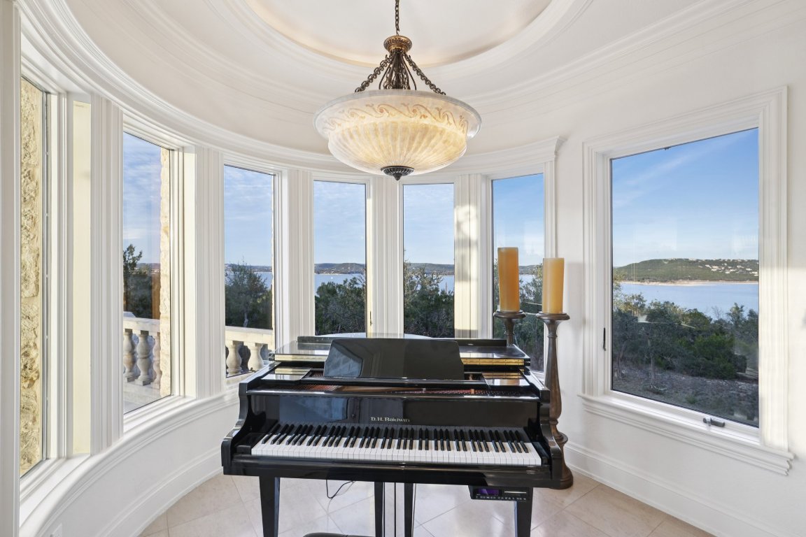 14701 Hornsby Hill Road Austin, TX 78734 - Photo 9 of 40 a living room with furniture and a large window