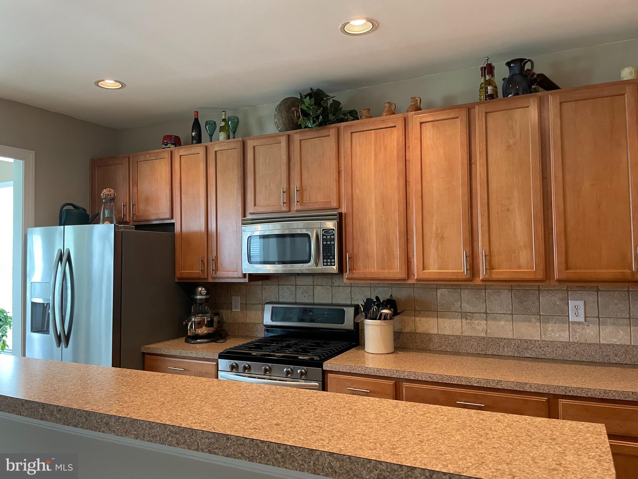 24799 Rivers Edge Road Millsboro, DE 19966 - Photo 5 of 23 large kitchen with spacious bar