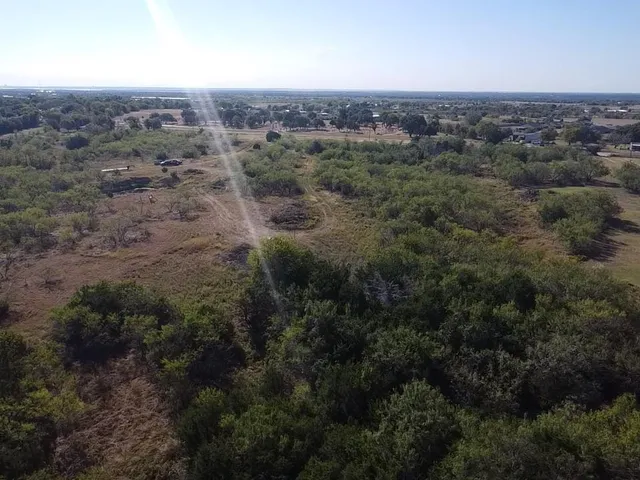 a view of a lake with mountains in the background