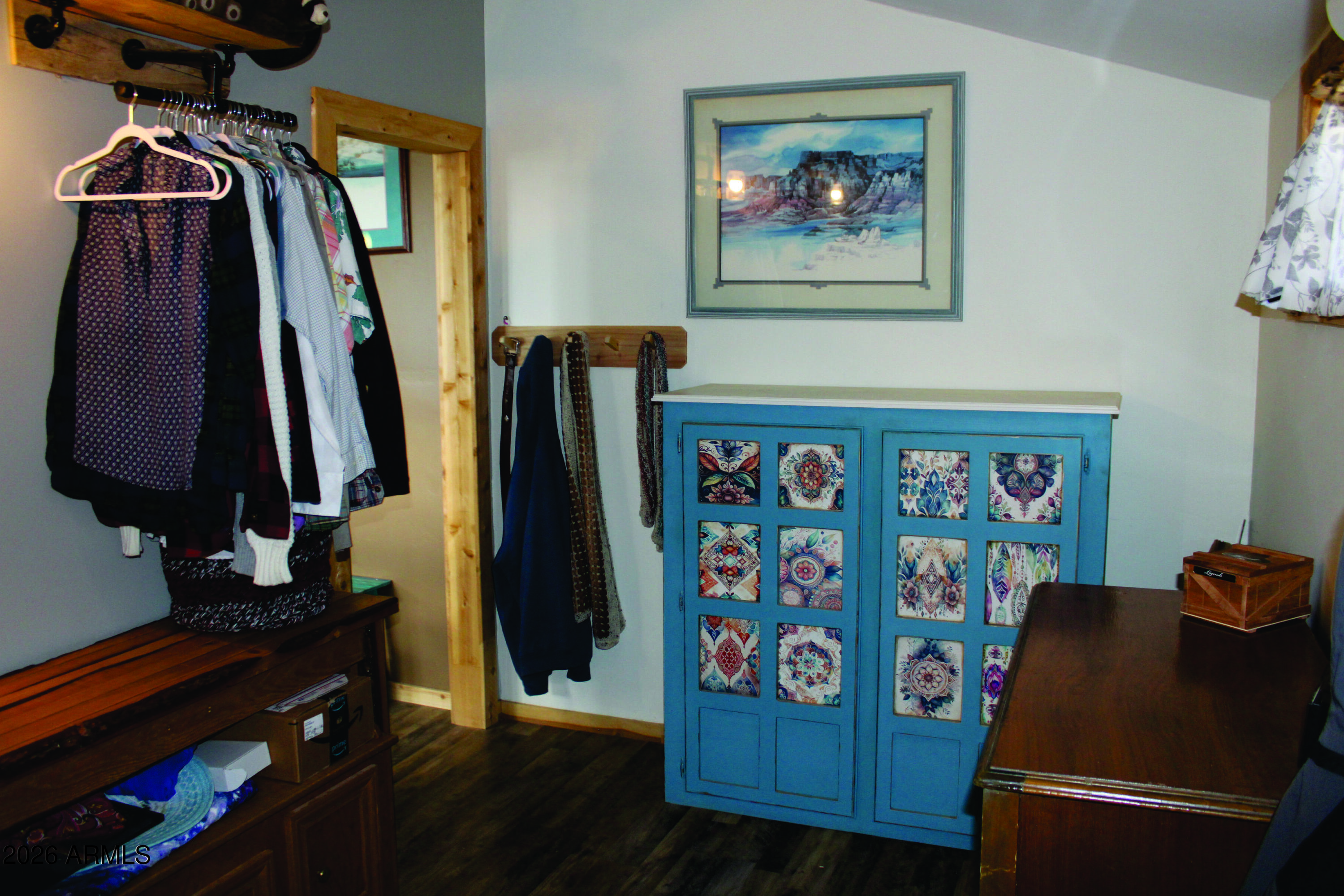 3236 North Cascabel Road Benson, AZ 85602 - Photo 14 of 63 a view of a closet with storage