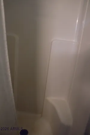 a aerial view of a house with a yard