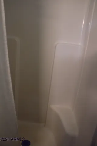 a aerial view of a house with a yard