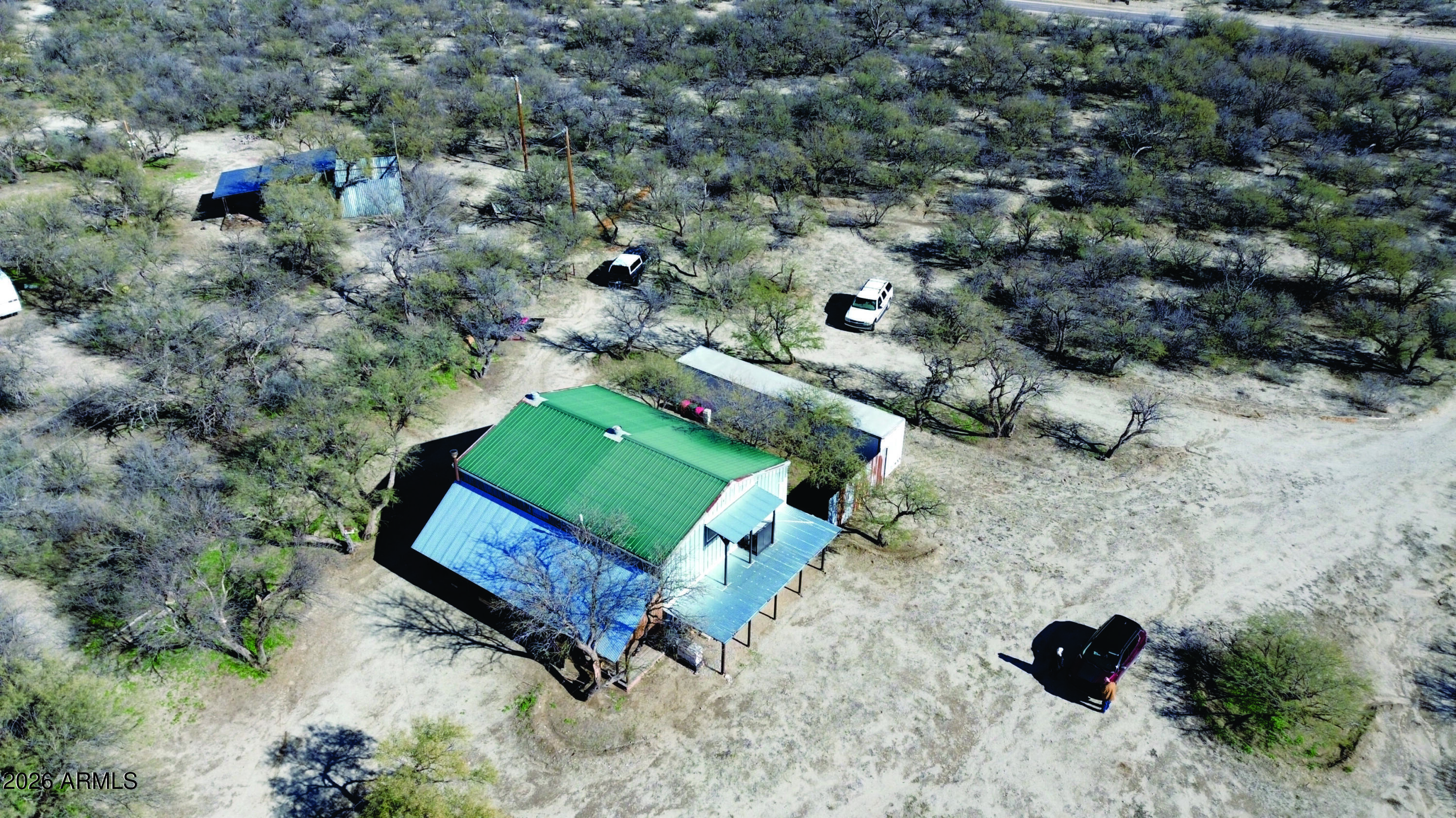 3236 North Cascabel Road Benson, AZ 85602 - Photo 23 of 63 a view of houses in outdoor space