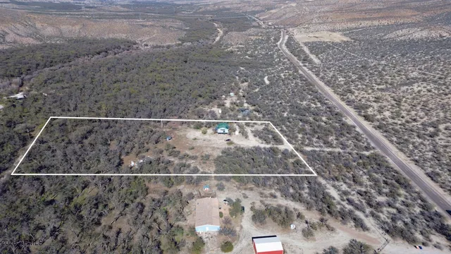 a view of a car park in front of house