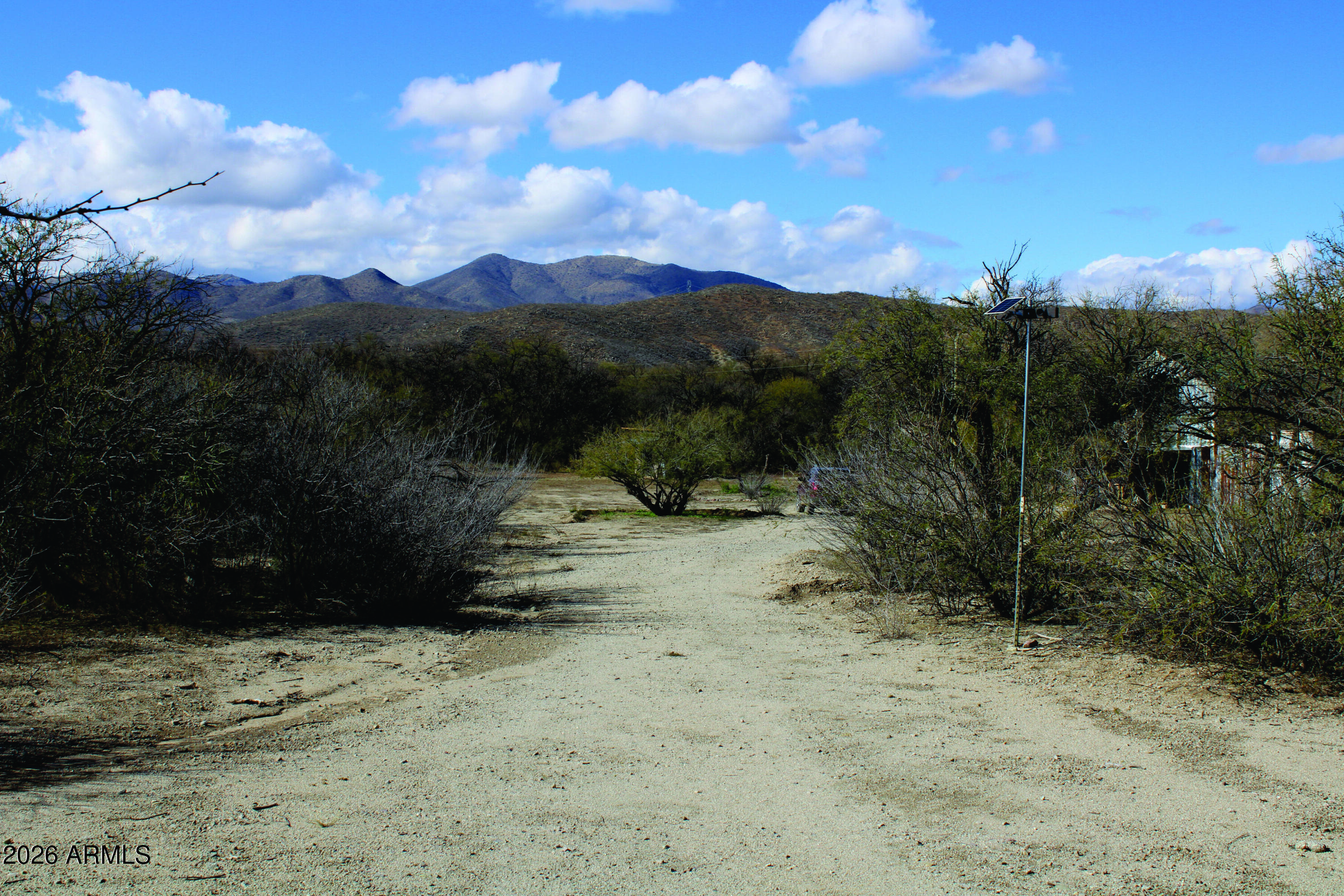 3236 North Cascabel Road Benson, AZ 85602 - Photo 42 of 63 a view of a dry yard