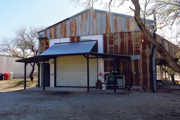 a view of a chairs and tables in patio