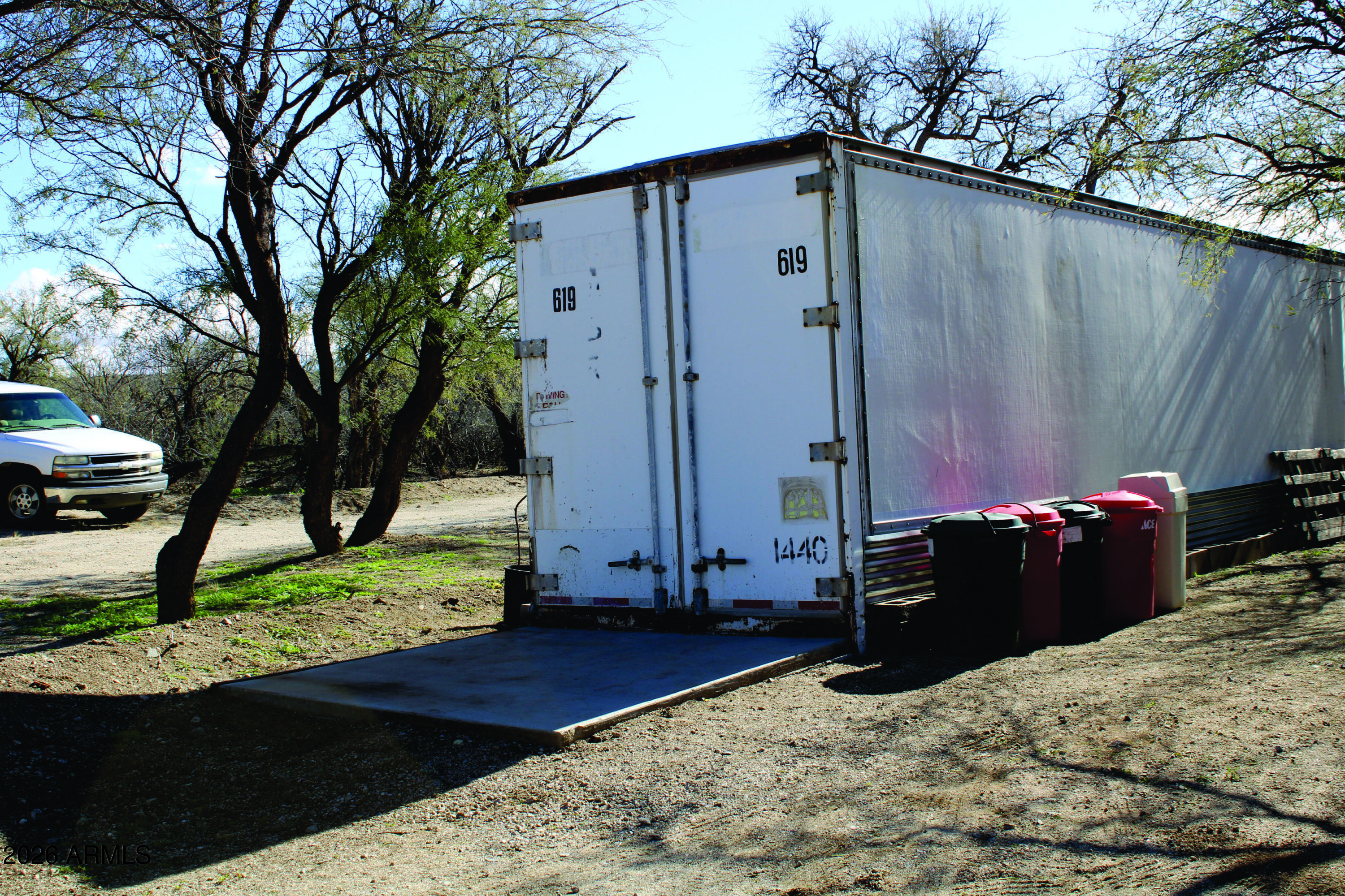 3236 North Cascabel Road Benson, AZ 85602 - Photo 50 of 63 a view of a backyard of the house