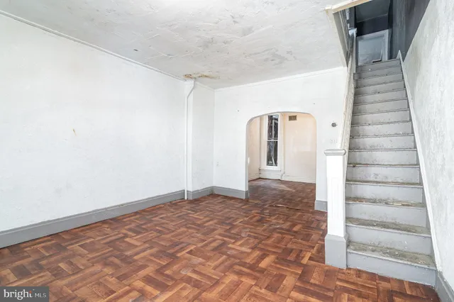 a view of entryway with stairs