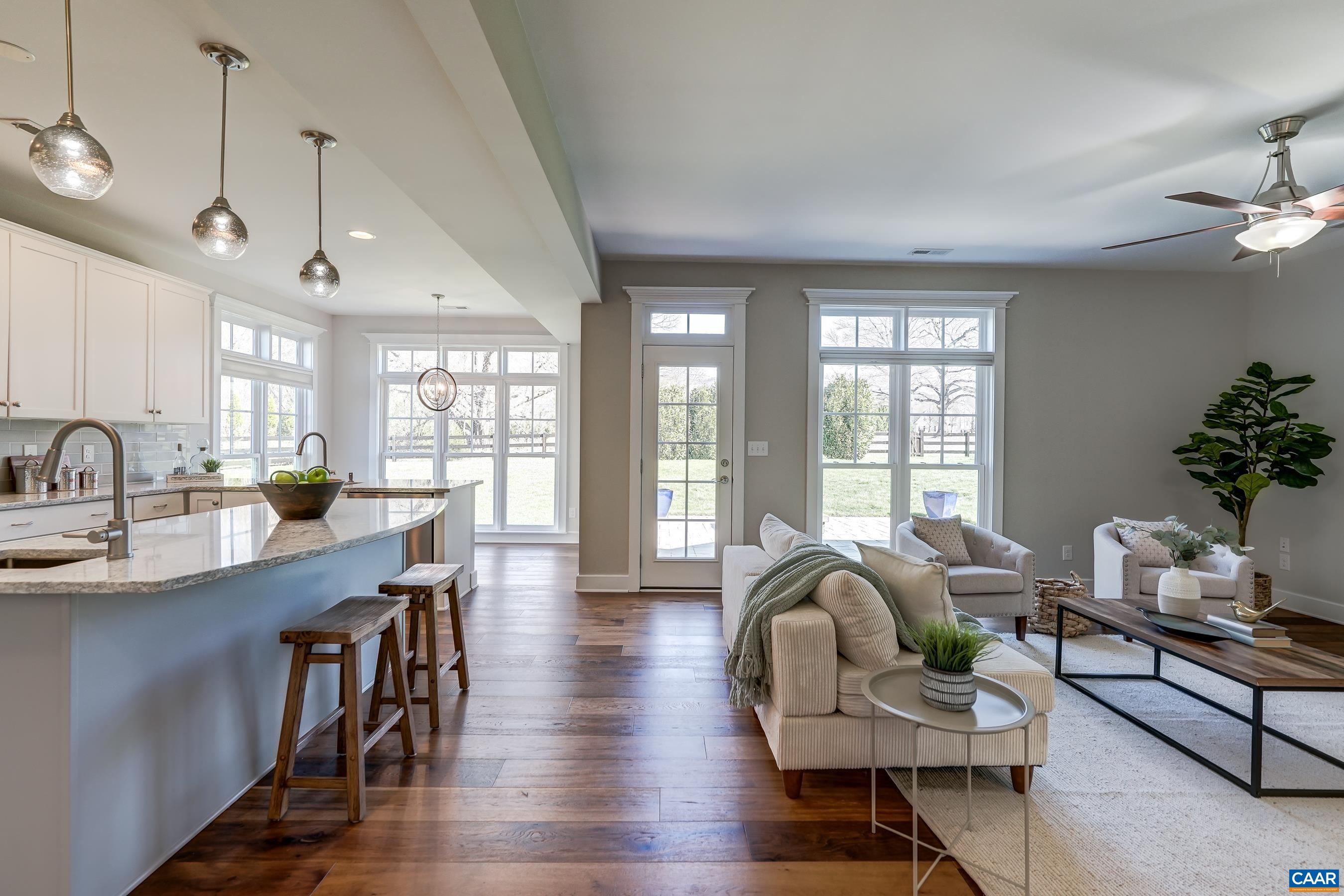 7659 Birchwood Hill Road Crozet, VA 22932 - Photo 64 of 64 a living room with furniture a window and wooden floor