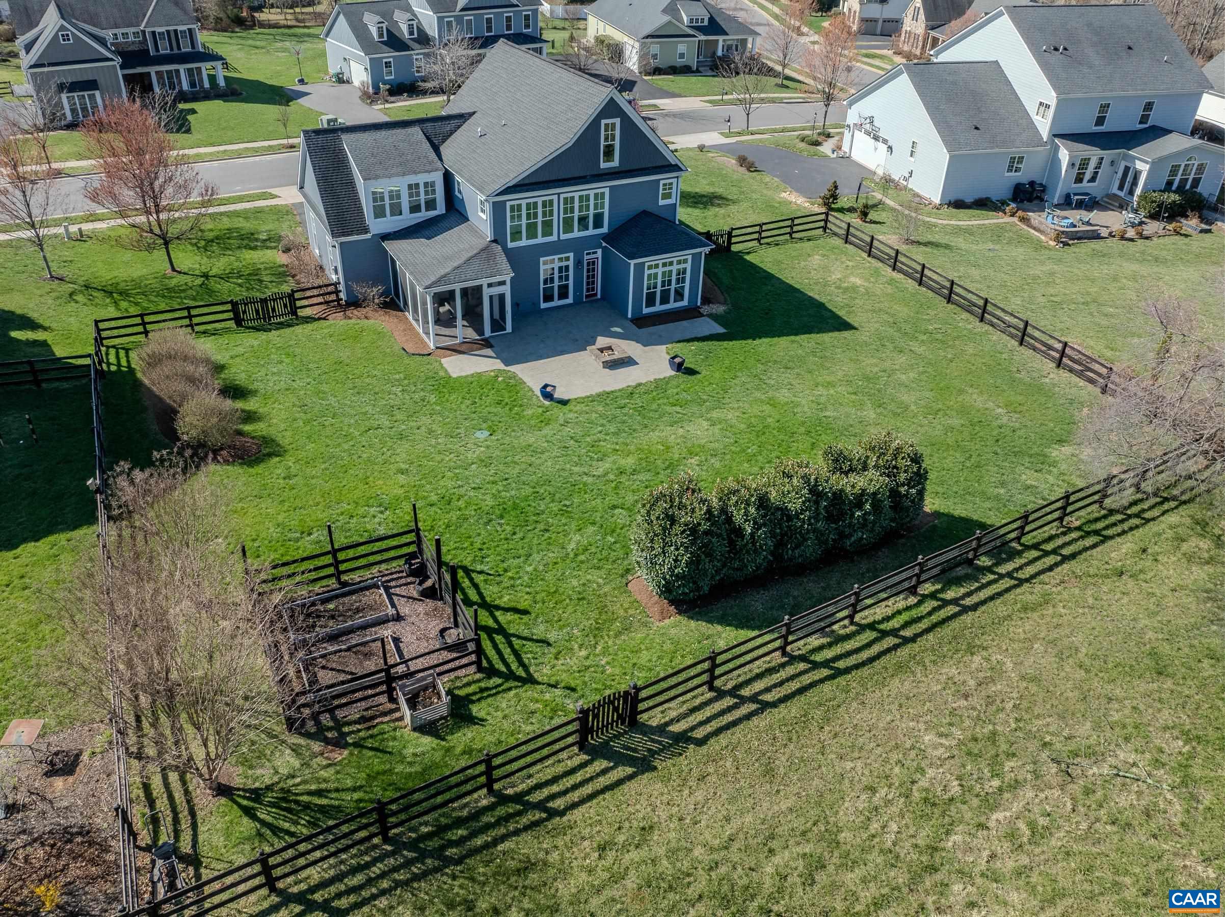 7659 Birchwood Hill Road Crozet, VA 22932 - Photo 2 of 64 Fenced back yard with gardens, patio with firepit and great screened porch!