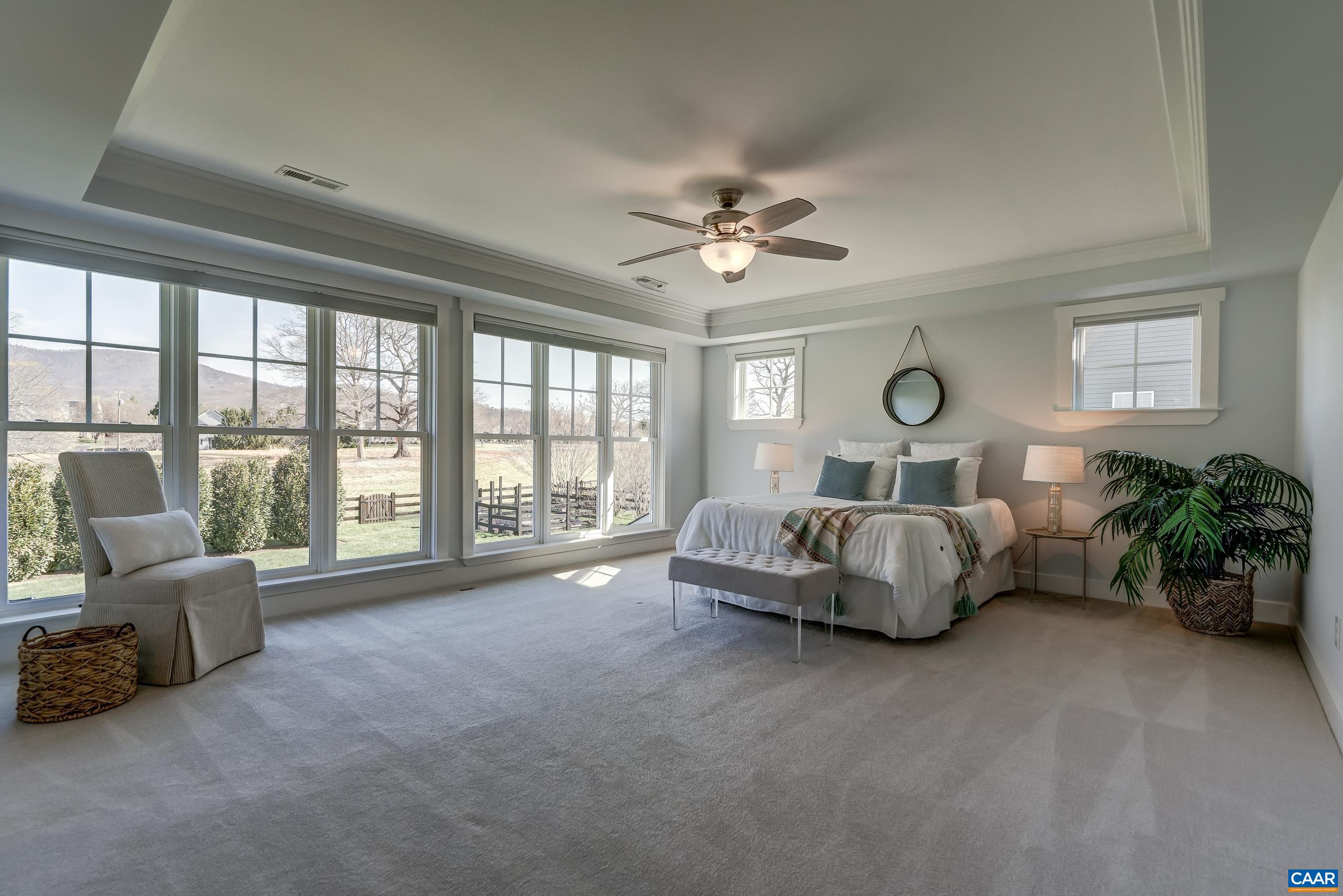 7659 Birchwood Hill Road Crozet, VA 22932 - Photo 28 of 64 a living room with furniture and large windows