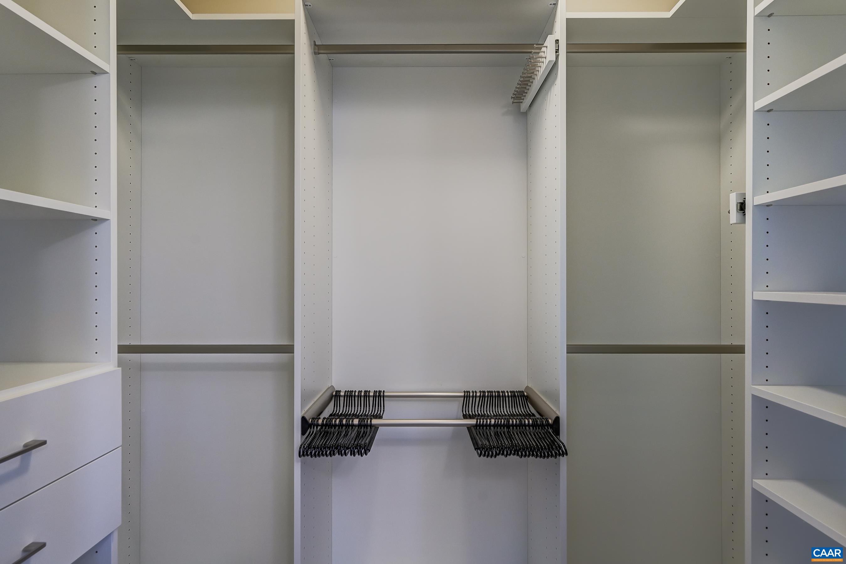 7659 Birchwood Hill Road Crozet, VA 22932 - Photo 31 of 64 a view of walk in closet with clothes