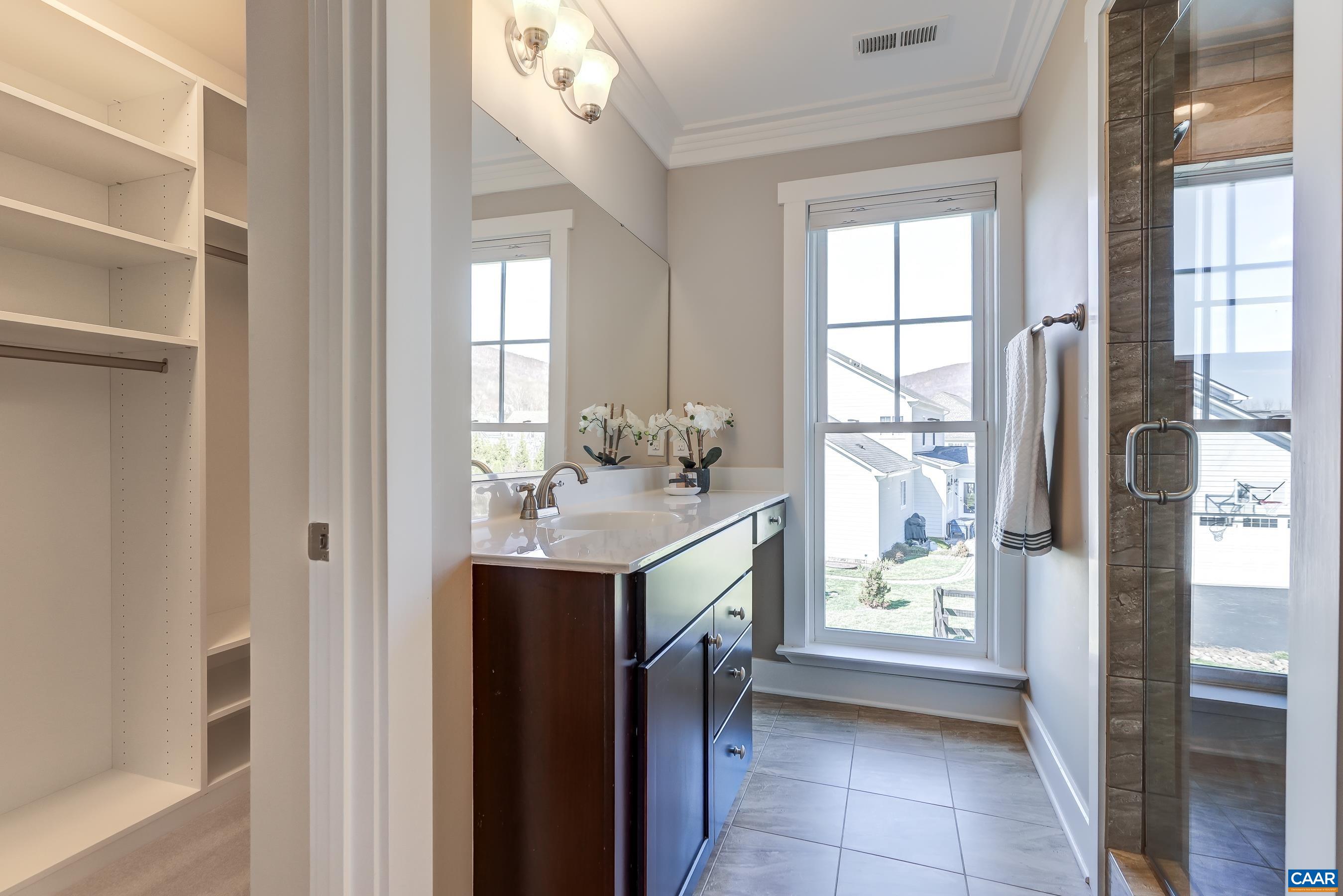 7659 Birchwood Hill Road Crozet, VA 22932 - Photo 33 of 64 a kitchen with a sink and a refrigerator