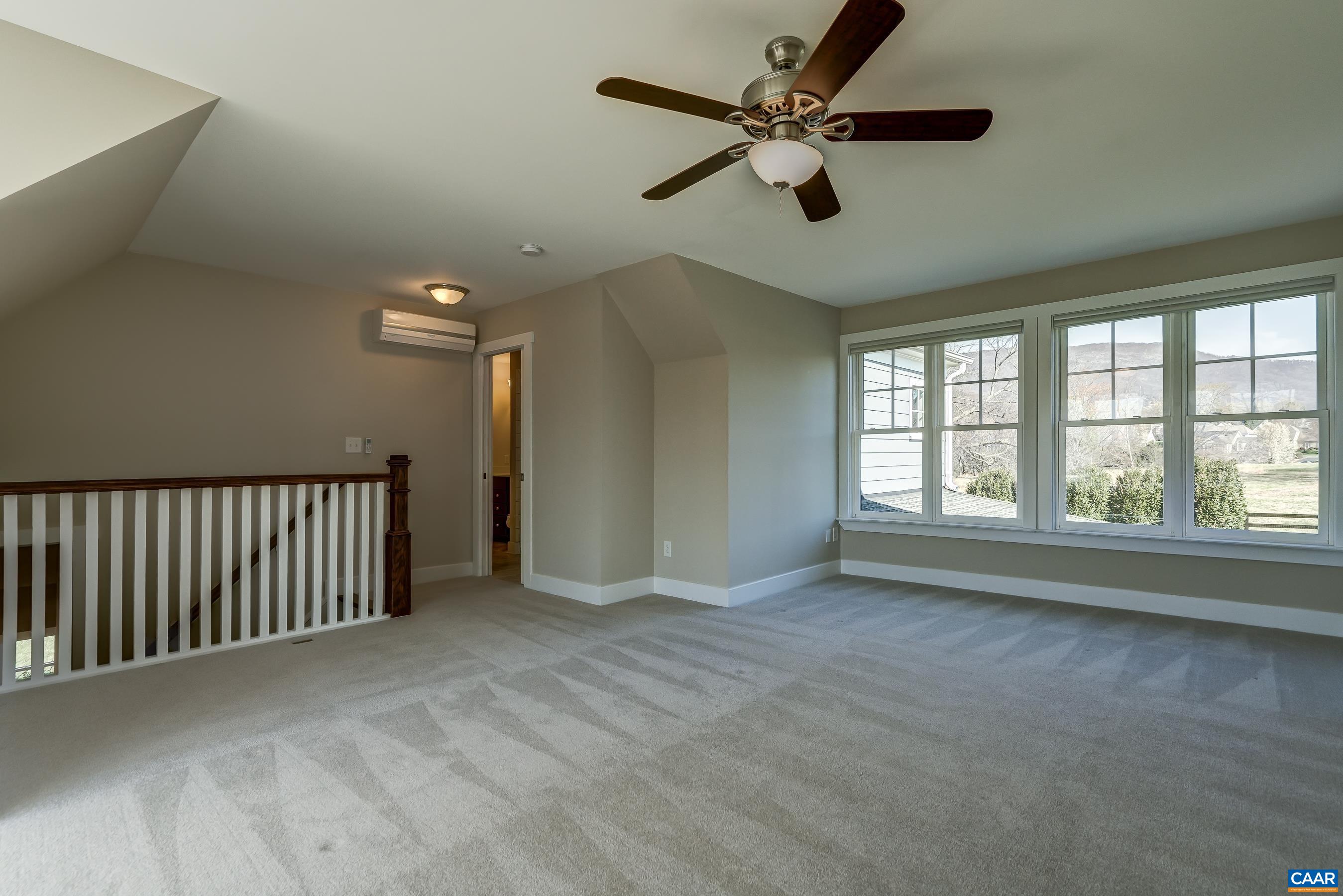 7659 Birchwood Hill Road Crozet, VA 22932 - Photo 40 of 64 a view of an empty room with a window