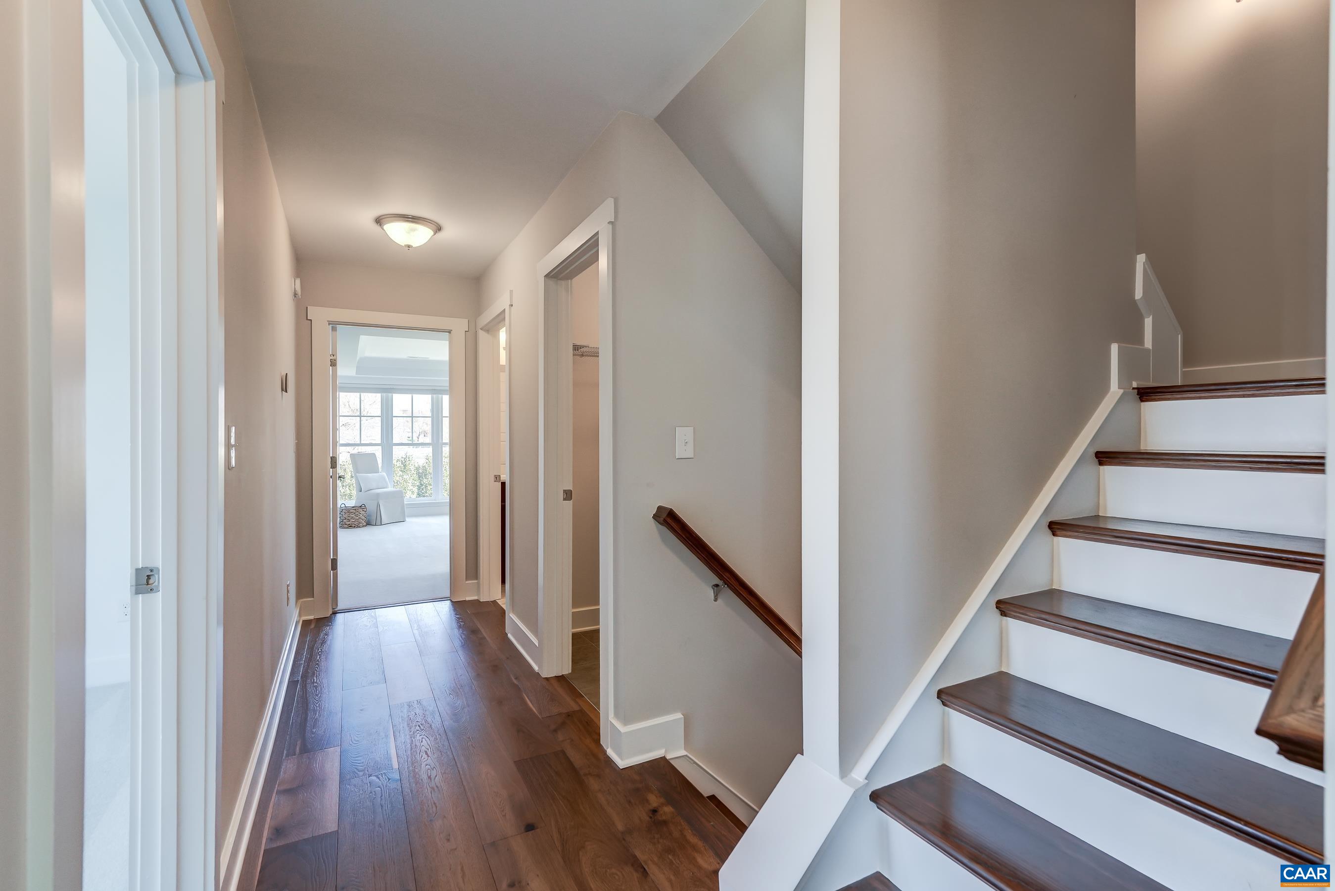 7659 Birchwood Hill Road Crozet, VA 22932 - Photo 42 of 64 a view of a hallway with wooden floor and entryway