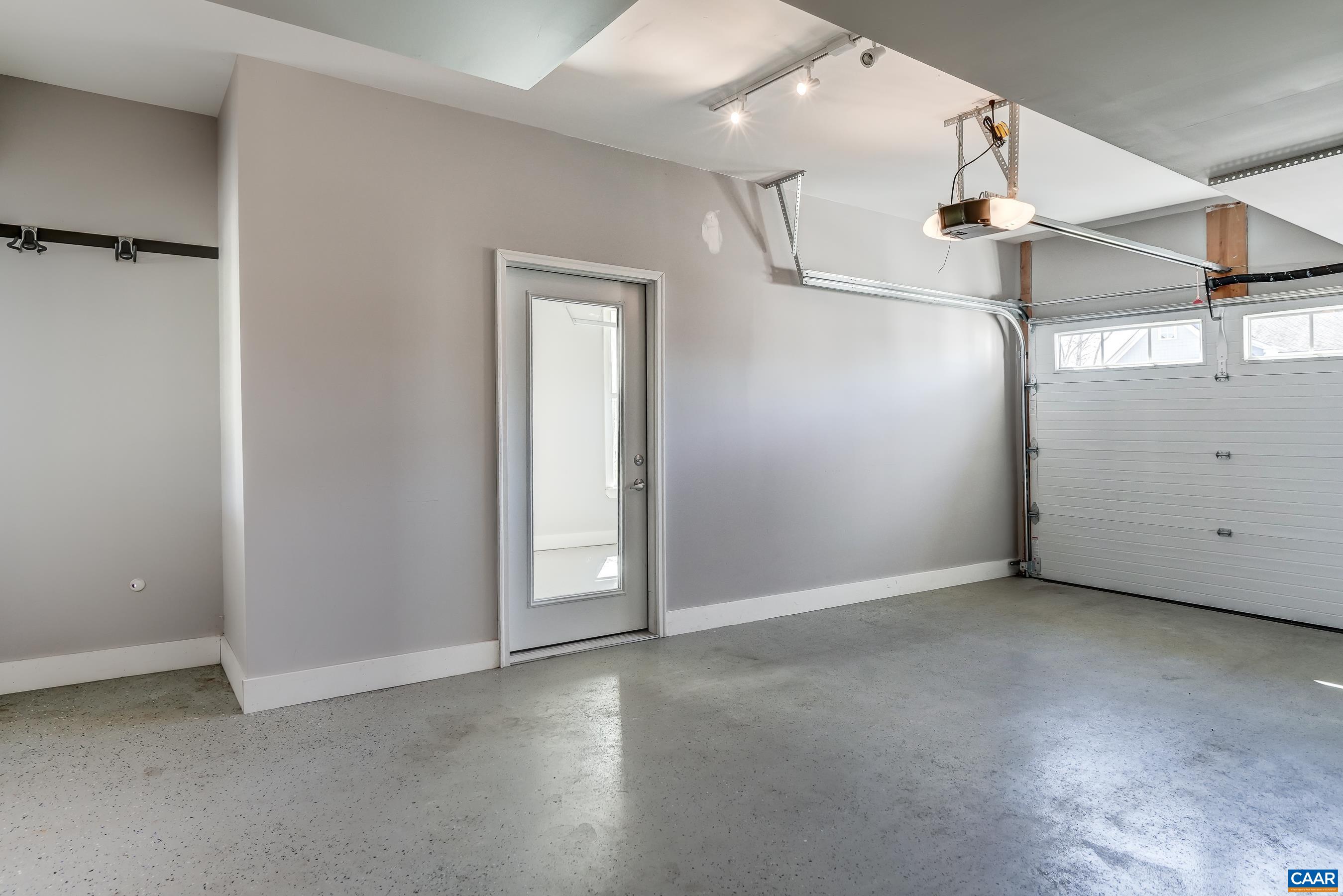 7659 Birchwood Hill Road Crozet, VA 22932 - Photo 47 of 64 Divided two-car garage with epoxy floors.