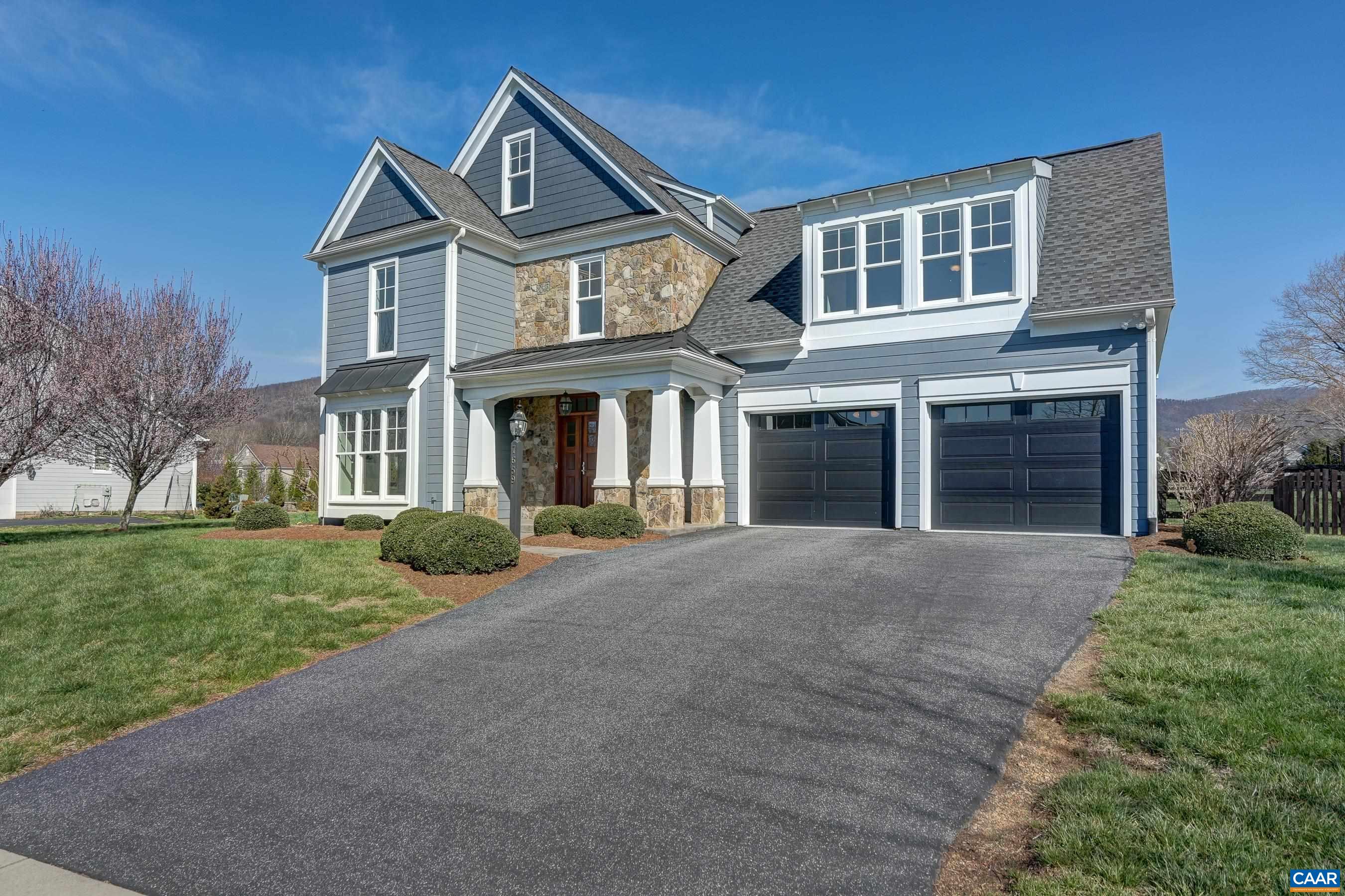 7659 Birchwood Hill Road Crozet, VA 22932 - Photo 49 of 64 front view of a house with a yard