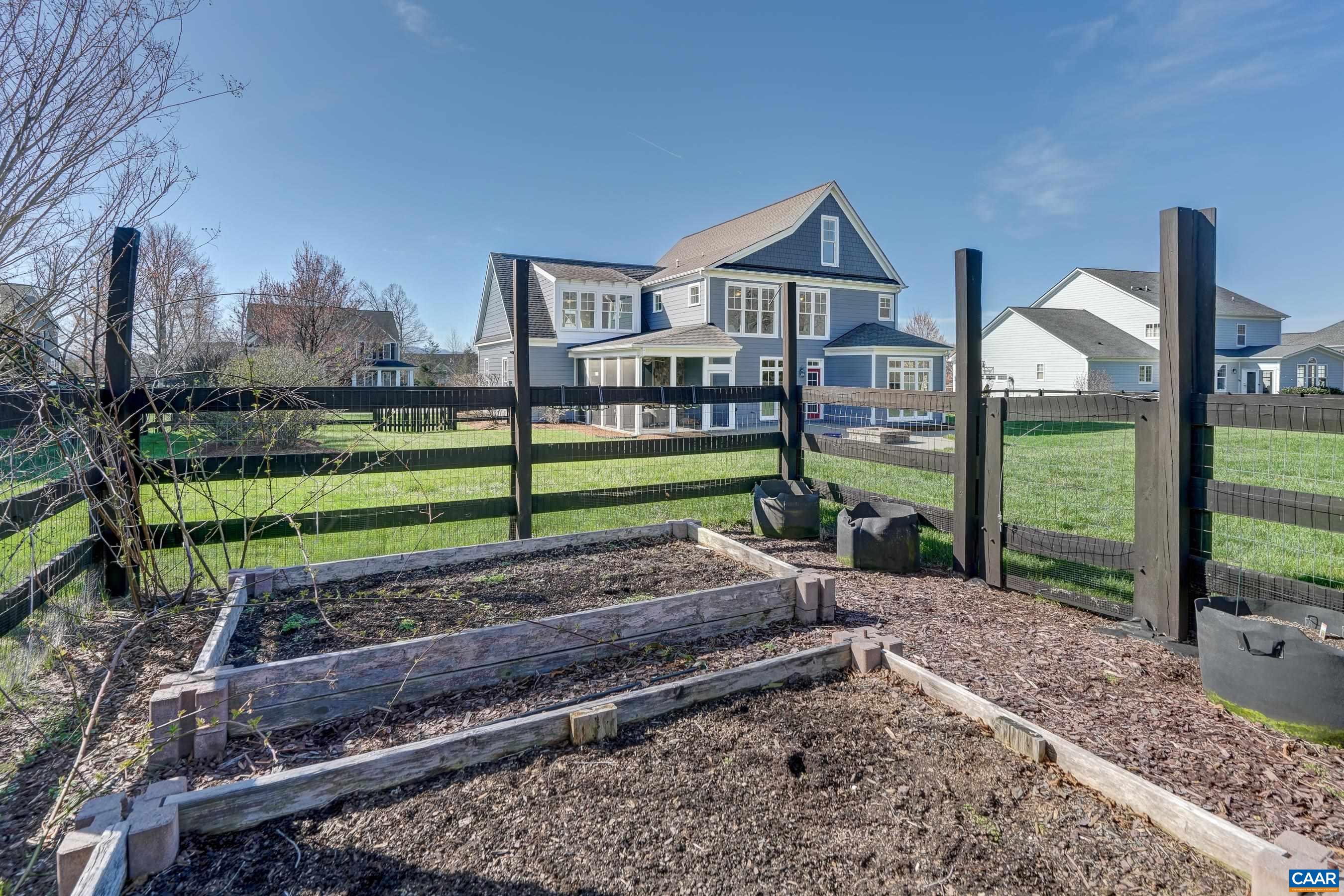 7659 Birchwood Hill Road Crozet, VA 22932 - Photo 51 of 64 a view of a house with a yard and a large tree