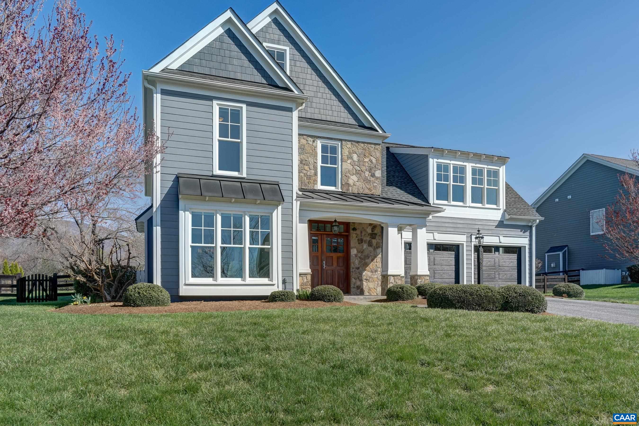 7659 Birchwood Hill Road Crozet, VA 22932 - Photo 53 of 64 a front view of a house with a yard
