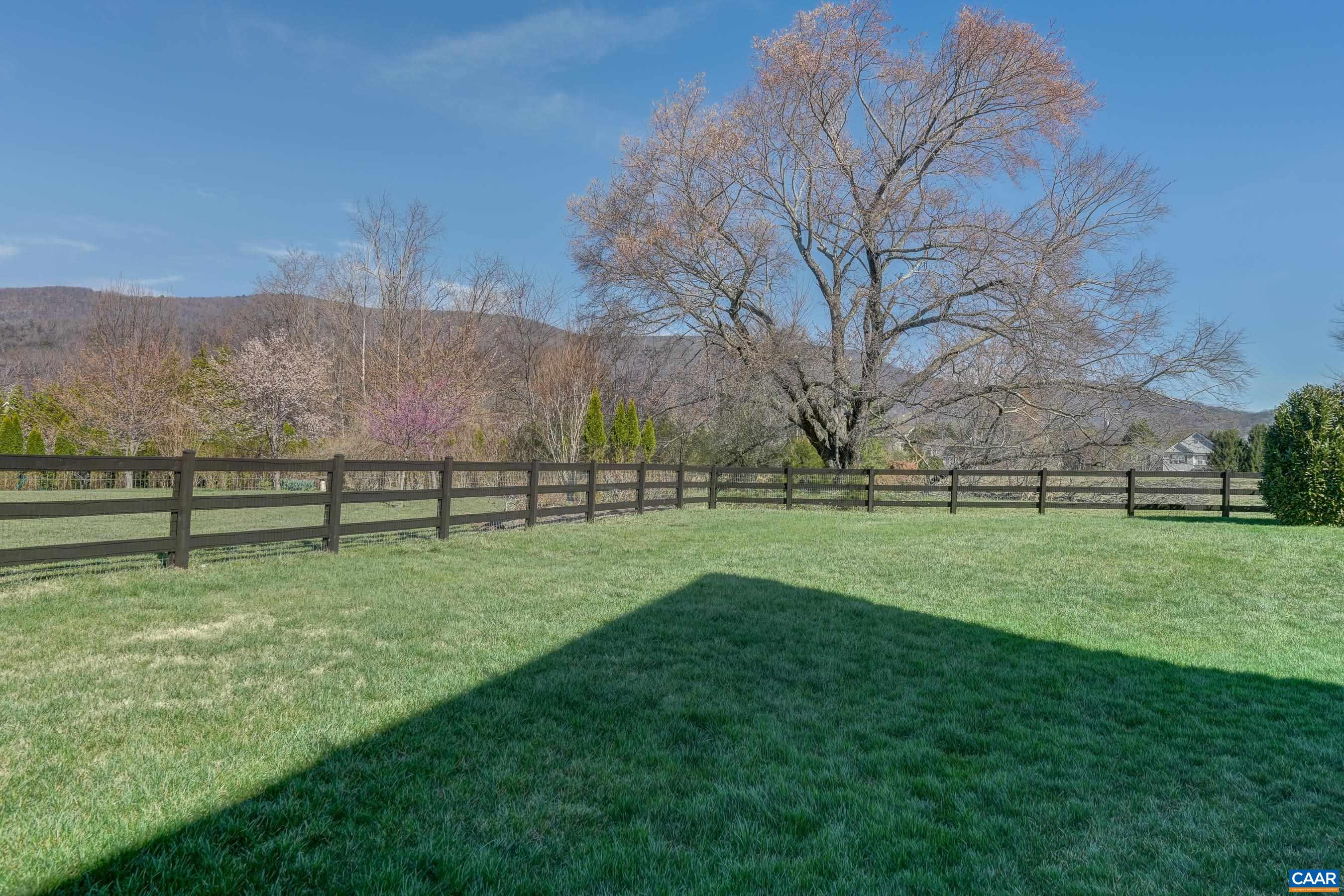 7659 Birchwood Hill Road Crozet, VA 22932 - Photo 55 of 64 a view of field with trees in the background