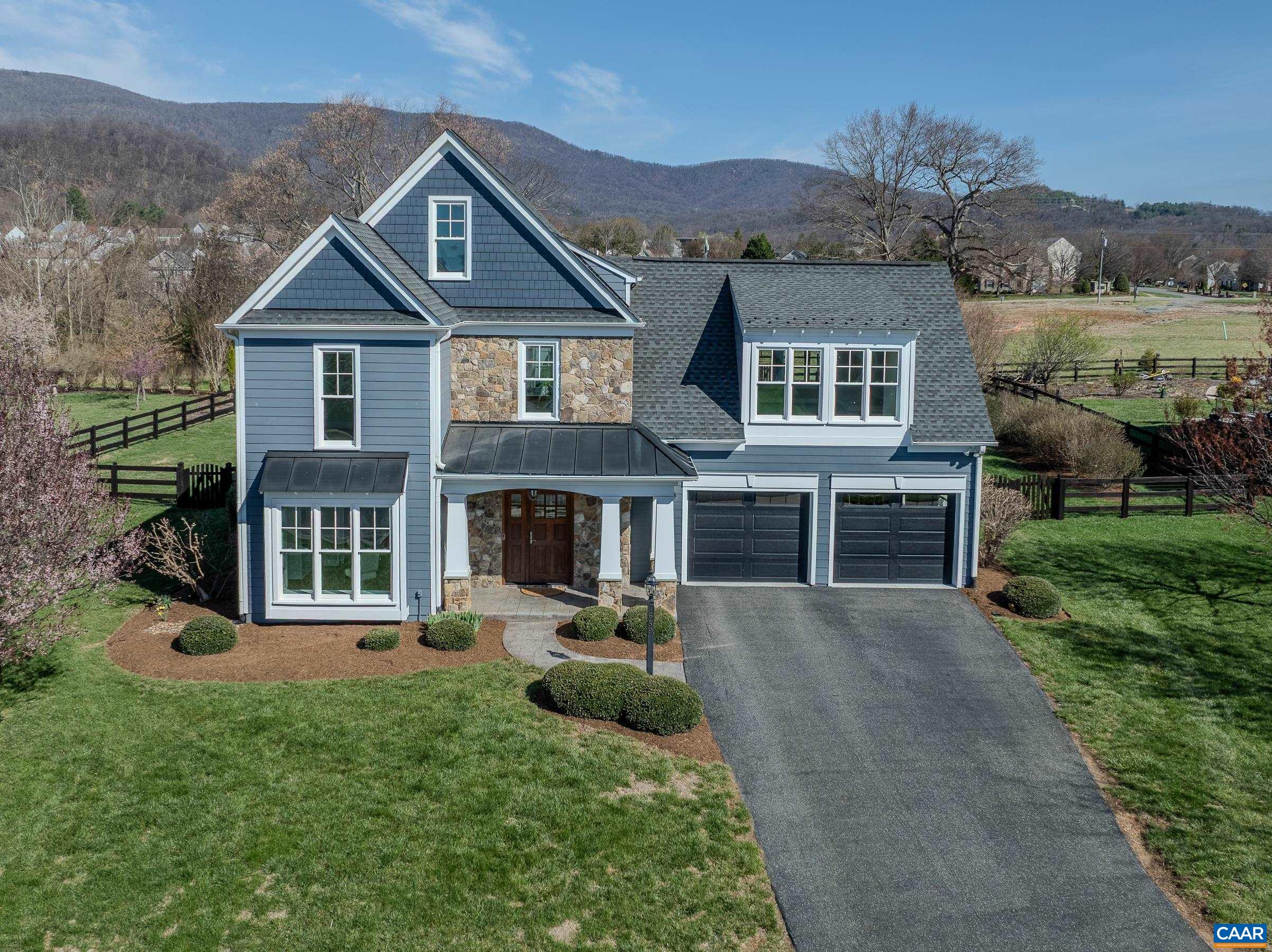 7659 Birchwood Hill Road Crozet, VA 22932 - Photo 61 of 64 front view of a house with a yard