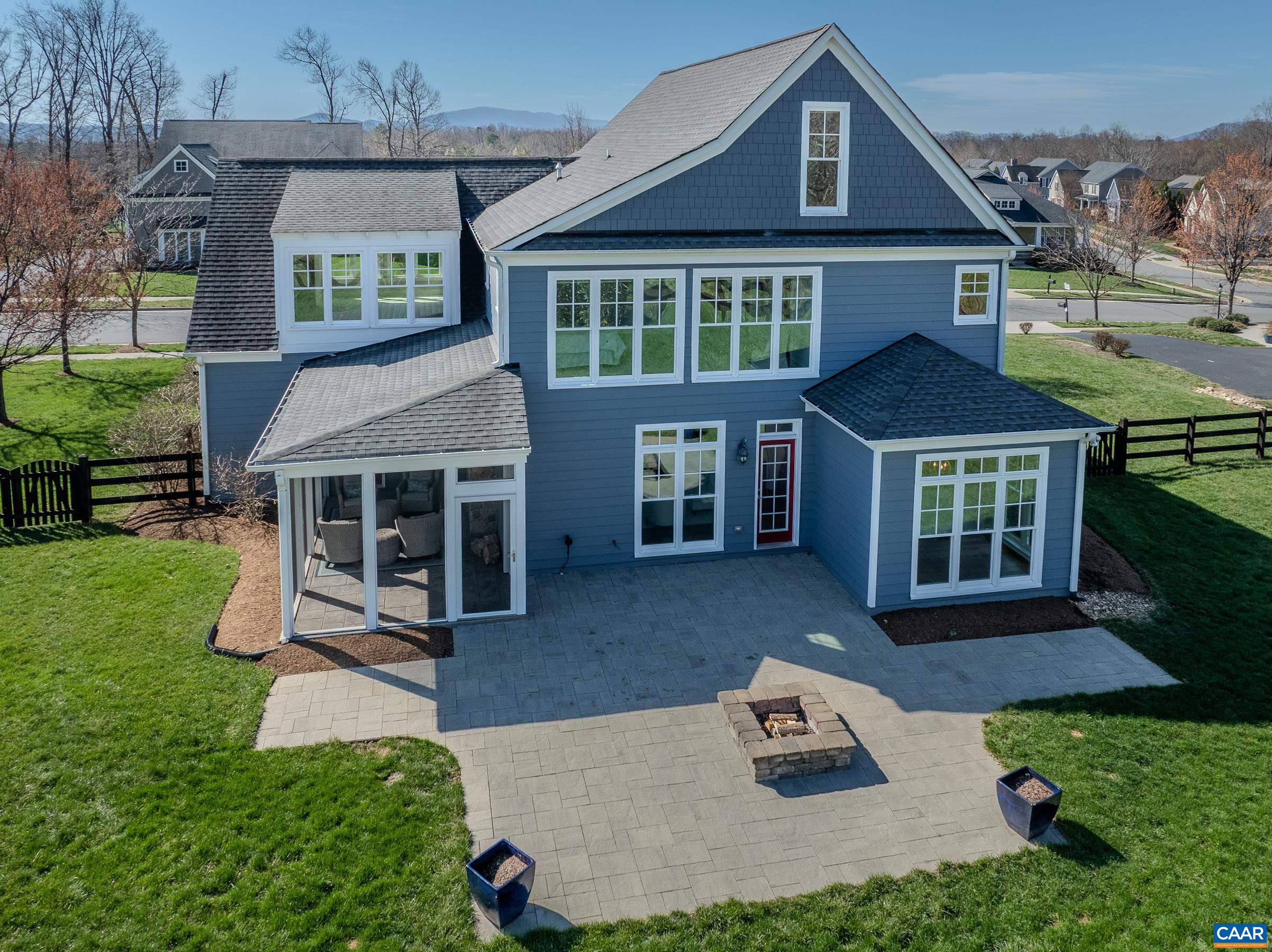 7659 Birchwood Hill Road Crozet, VA 22932 - Photo 63 of 64 a front view of a house with a yard