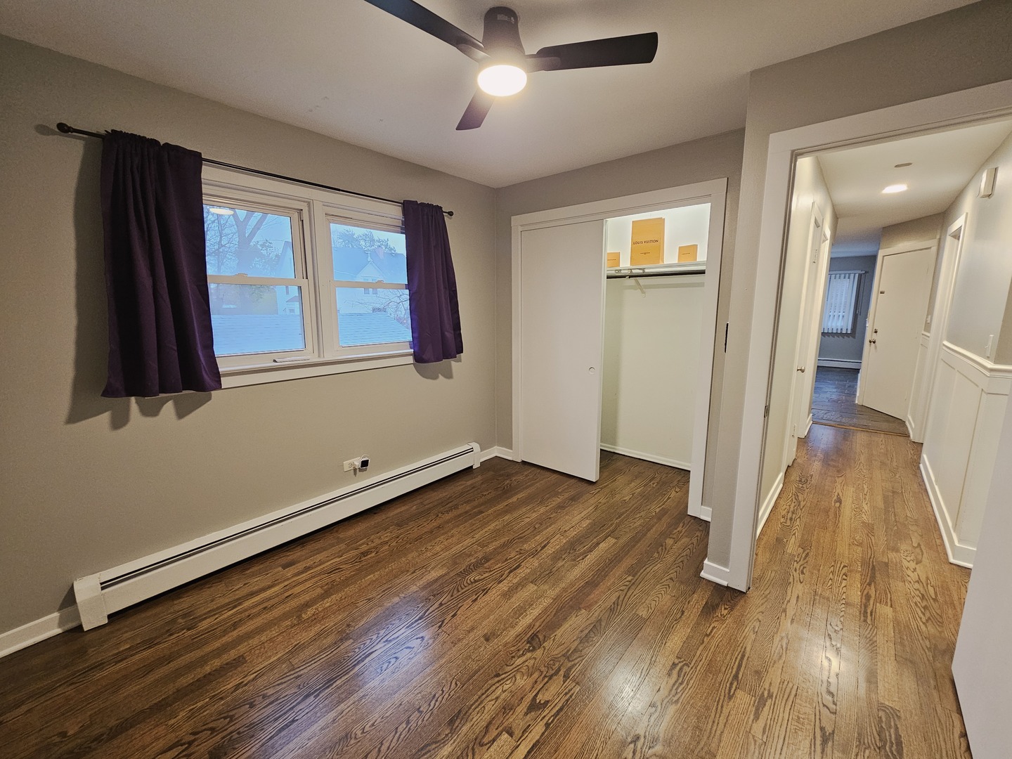 311 Maple Avenue, Unit 2 Downers Grove, IL 60515 - Photo 18 of 33 wooden floor in an empty room with a window