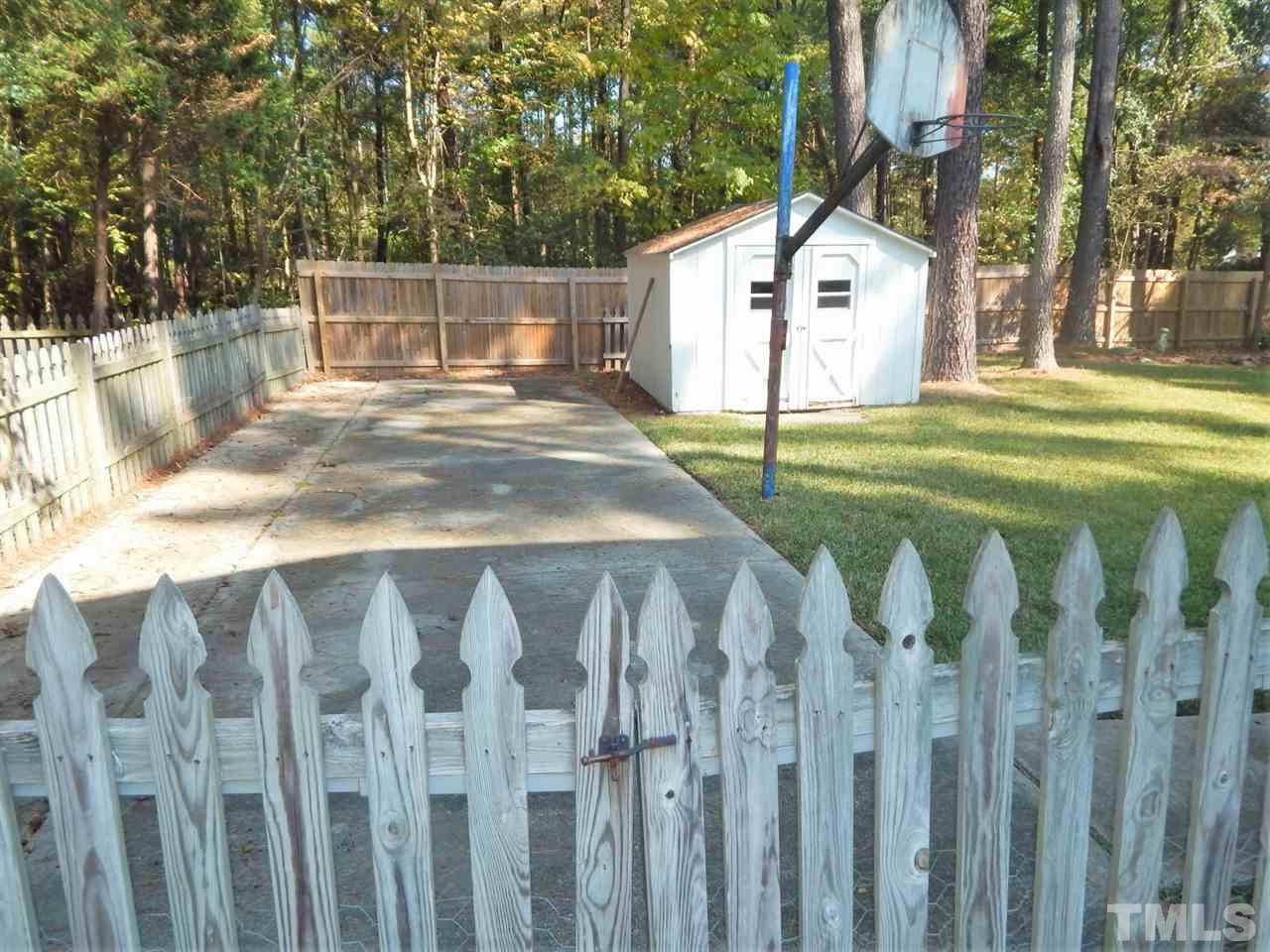 4829 Draper Road Raleigh, NC 27616 - Photo 20 of 25 a view of a park with a fence