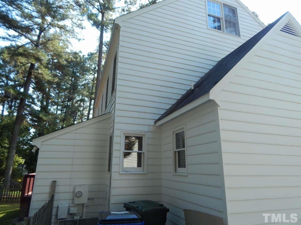 4829 Draper Road Raleigh, NC 27616 - Photo 21 of 25 a view of a house with a door