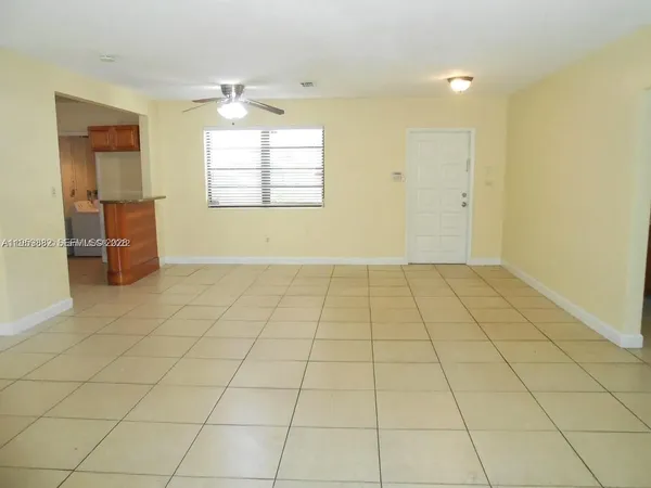 a kitchen with stainless steel appliances granite countertop a sink and a stove