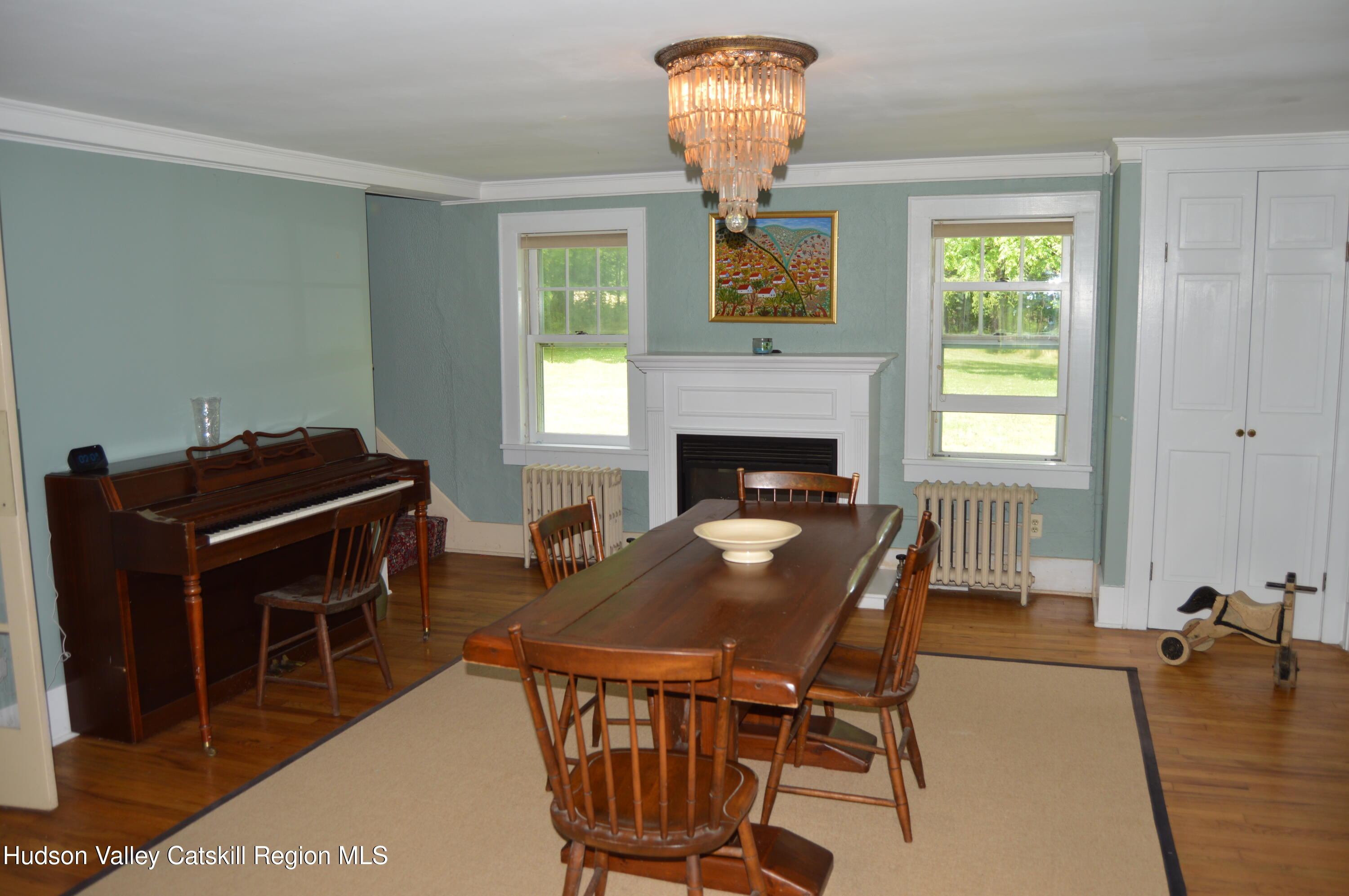3493 County Road 7 Craryville, NY 12521 - Photo 13 of 36 a livingroom with furniture and a fireplace