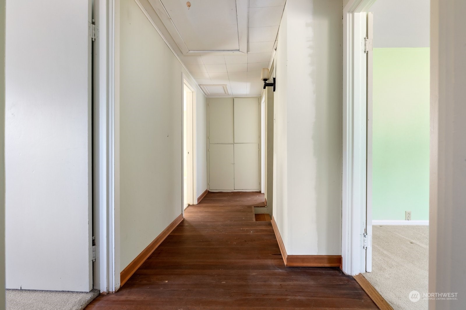 2575 Thompson Road Langley, WA 98260 - Photo 25 of 37 a view of a hallway with wooden floor