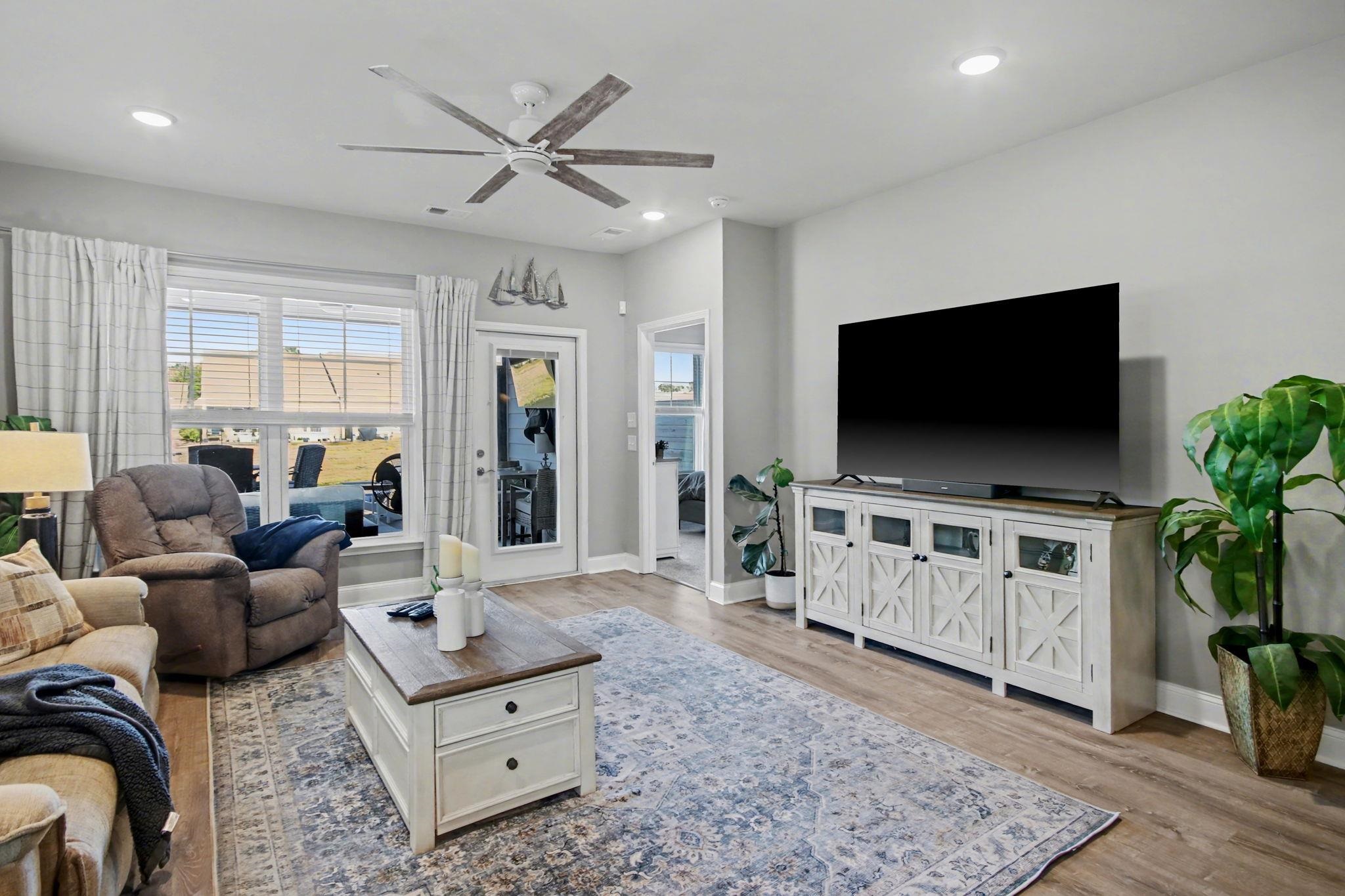 5830 Cremona Drive Myrtle Beach, SC 29577 - Photo 18 of 39 Living area featuring a ceiling fan, light wood-type flooring, and recessed lighting