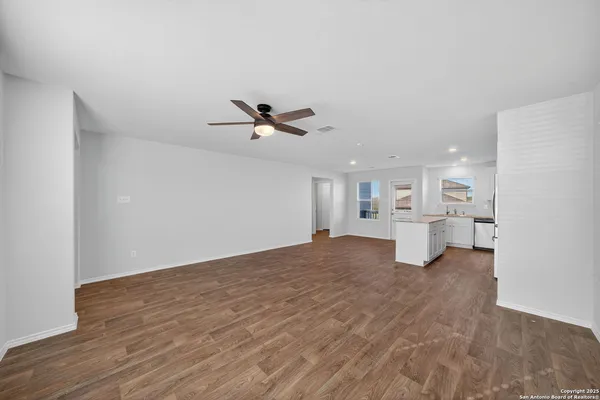 a view of a livingroom with a ceiling fan