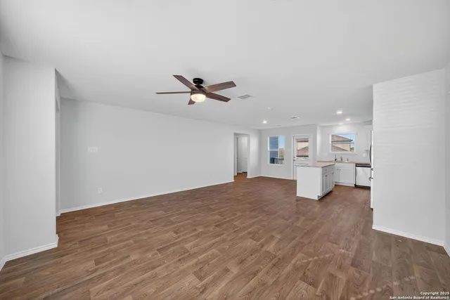 a view of a livingroom with a ceiling fan