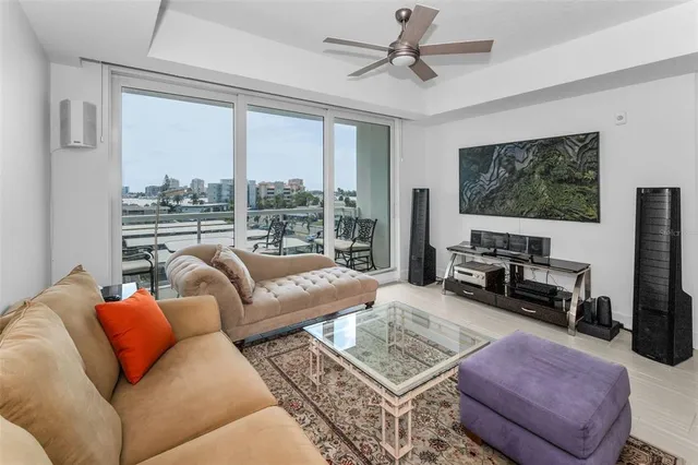 a kitchen with stainless steel appliances kitchen island granite countertop a sink and cabinets