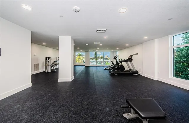 a view of a lake with houses in the background