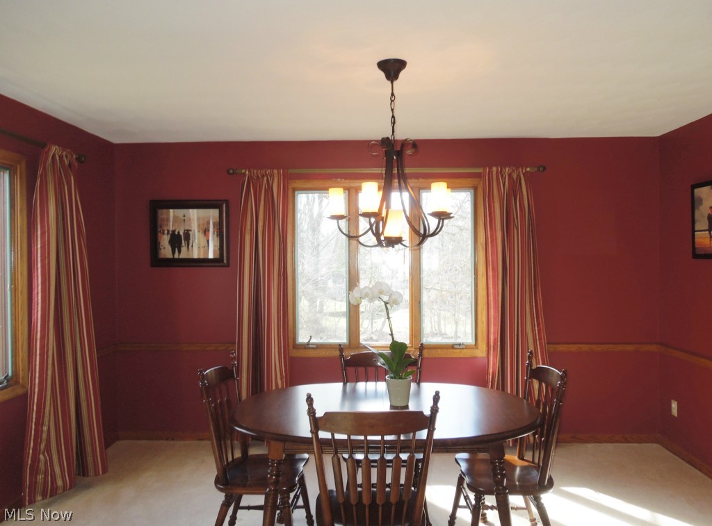 3824 Greentree Road Stow, OH 44224 - Photo 5 of 24 Spacious dining room perfect for large table! Updated lighting fixture too!