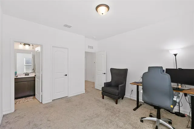 a view of a livingroom with furniture and a couch