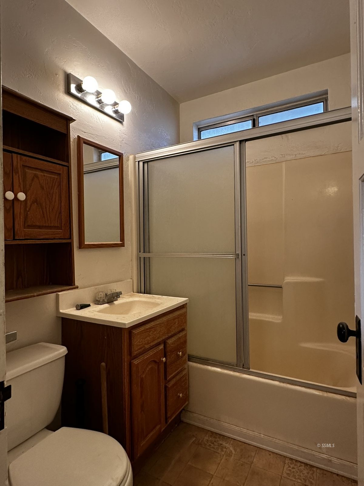 301 South Richmond Road Ridgecrest, CA 93555 - Photo 14 of 45 a bathroom with a sink toilet and shower