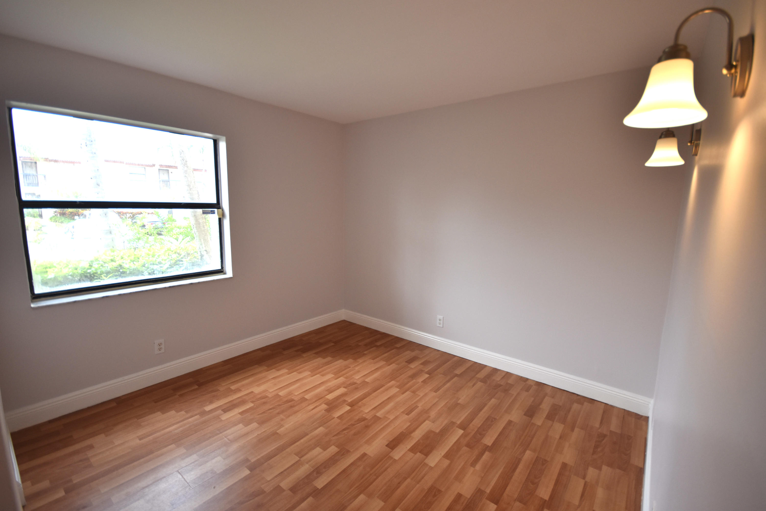 22064 Palms Way, Unit 103 Boca Raton, FL 33433 - Photo 13 of 16 Guest Bedroom