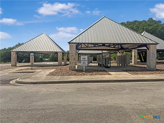 a view of swimming pool with a yard and seating area