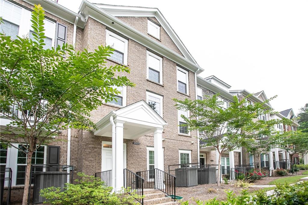 2033 Humboldt Park Lane Decatur, GA 30033 - Photo 1 of 1 a view of a building with a yard