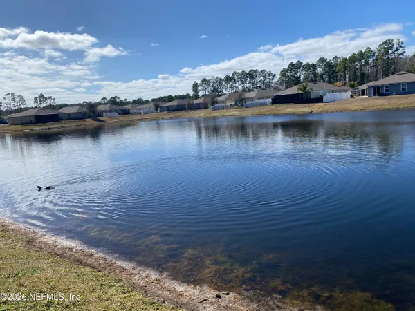 a view of a lake with houses